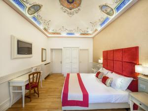 Posteľ alebo postele v izbe v ubytovaní Dei Priori Boutique Hotel