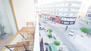 a view of a city street from a building at 1A BEACH & BUSINESS Apartment in the City CENTER! in Larnaka