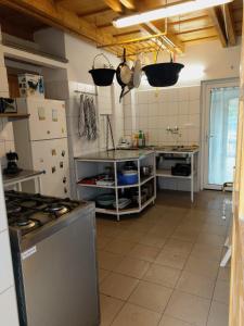 A kitchen or kitchenette at Klára-Háza Vendégház
