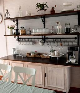 A kitchen or kitchenette at Klára-Háza Vendégház