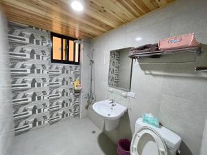 Kupaonica u objektu Qilixiang Homestay