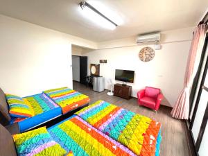 Voodi või voodid majutusasutuse Qilixiang Homestay toas
