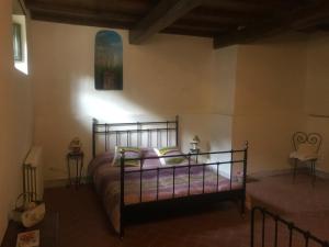 Postel nebo postele na pokoji v ubytování Agriturismo Le Dogane
