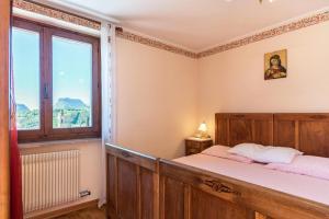 Postel nebo postele na pokoji v ubytování Ciclamino Standard Vittoria