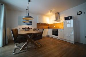 Kuchyň nebo kuchyňský kout v ubytování Appartement Am Postwiesen