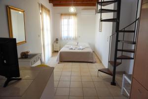 Posteľ alebo postele v izbe v ubytovaní Agapi Holiday Home