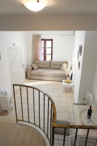 A bed or beds in a room at Agapi Holiday Home