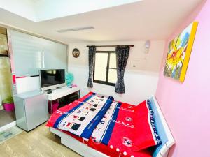 Voodi või voodid majutusasutuse Qilixiang Homestay toas