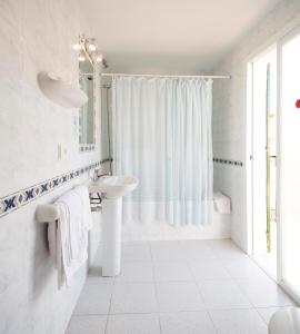 Koupelna v ubytování Hostal Marí