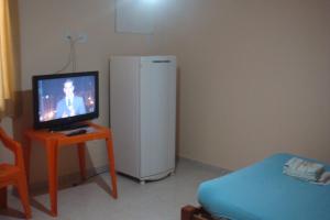 TV a/nebo společenská místnost v ubytování stellamares suites