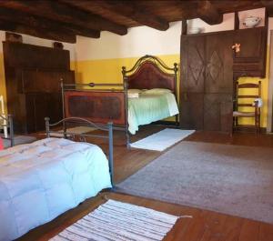 Un pat sau paturi într-o cameră la Affittacamere Coletti