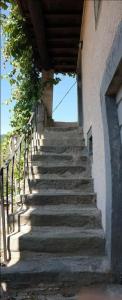 a set of stairs leading up to a building at Affittacamere Coletti in Roggio