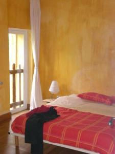 מיטה או מיטות בחדר ב-Les Tournesols