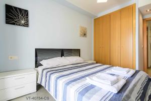 Ένα ή περισσότερα κρεβάτια σε δωμάτιο στο Apartamento en Residencial Aldea Golf Panorámica