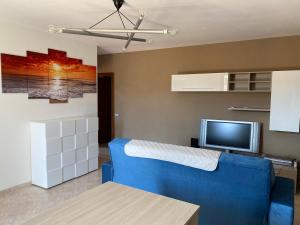 A television and/or entertainment centre at Cinque Terre Casa Vacanze