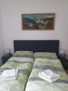 Postel nebo postele na pokoji v ubytování Gasthaus Blunzenwirt