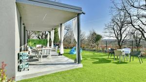 Vonkajšia záhrada v ubytovaní Villa Barcolana