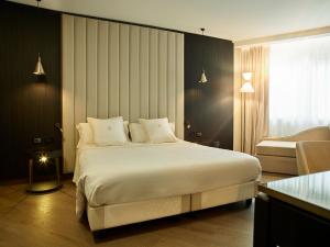 Postel nebo postele na pokoji v ubytování Hotel Niccolo' V - Terme dei Papi
