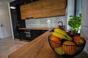 Kuchyňa alebo kuchynka v ubytovaní Apartament Lawendowy