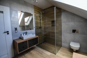 Kúpeľňa v ubytovaní Apartament Lawendowy