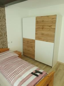 Postel nebo postele na pokoji v ubytování Gasthaus Blunzenwirt