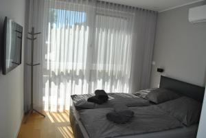 Postel nebo postele na pokoji v ubytování Villa JOKA
