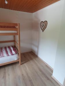 Postel nebo postele na pokoji v ubytování Gasthaus Blunzenwirt