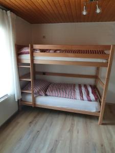 Postel nebo postele na pokoji v ubytování Gasthaus Blunzenwirt