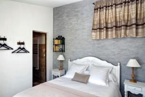 Postel nebo postele na pokoji v ubytování B&B Le Deffends de Redon + 37 fotografií