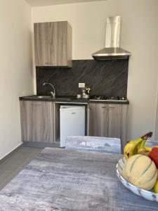 Kuchyň nebo kuchyňský kout v ubytování Affittacamere La Casa Dei Nonni