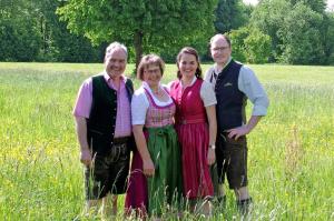 a group of people standing in a field at Landhaus Müller in Bad Birnbach