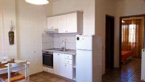 Kuchyňa alebo kuchynka v ubytovaní Ikos Studios and Apartments