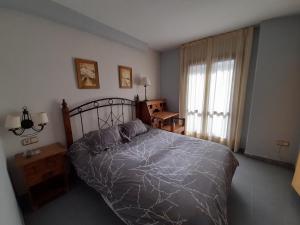 Postel nebo postele na pokoji v ubytování Hostal Casa Juan