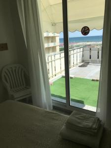 A balcony or terrace at Hotel Rivamare Only Room Breakfast