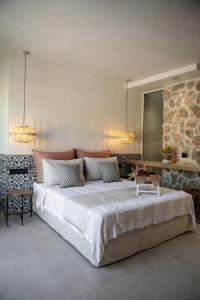 Ένα ή περισσότερα κρεβάτια σε δωμάτιο στο Delight Apartments suites +104 φωτογραφίες