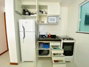 Köök või kööginurk majutusasutuses Arejado com Localização Estratégica e Varandão 203