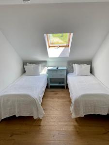 Tempat tidur dalam kamar di Haus Gnigl