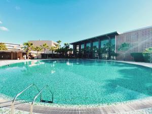 The swimming pool at or close to Casa Praia dos Salgados