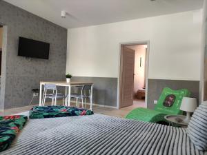 Łóżko lub łóżka w pokoju w obiekcie Apartamenty Bulwar Nadmorski, Ustka