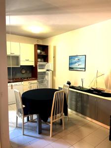 A kitchen or kitchenette at Punta Ala Flat