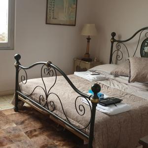 En eller flere senge i et værelse på GRAZZANO ANTICA STAZIONE