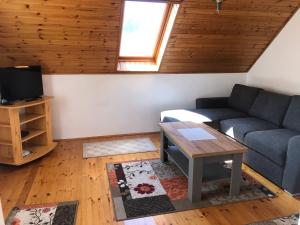 Posezení v ubytování Pacsirta Apartman