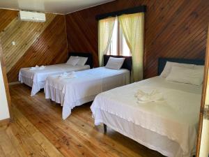 Postel nebo postele na pokoji v ubytování Coral View Beach Resort + 37 fotografií