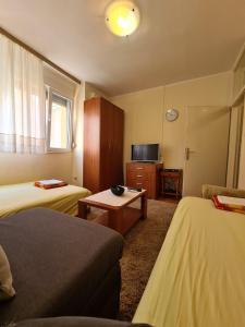 Katil atau katil-katil dalam bilik di City Centar Apartment