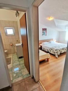 Posteľ alebo postele v izbe v ubytovaní Apartment Hramina