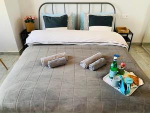 Giường trong phòng chung tại Apartments Monaco