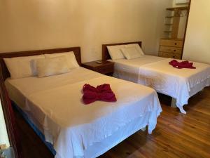 Tempat tidur dalam kamar di Coral View Beach Resort
