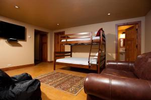 a living room with two bunk beds and a couch at 240 County Road 201 in Durango