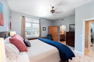 a bedroom with a large bed and a window at Mears House Unit 2D in Durango