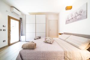 Postel nebo postele na pokoji v ubytování B&B Gonare